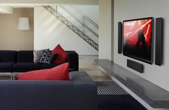 KEF T2 to kompaktowy subwoofer o płaskiej obudowie, idealny do nowoczesnych systemów kina domowego.